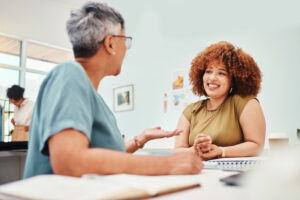 Getting Started - nurse and patient discuss applying for Polk HealthCare Plan